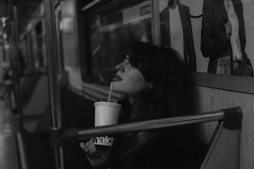 Woman on Metro Train in Black and White