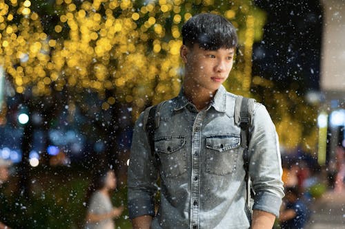 Man Wearing Gray Denim Jacket