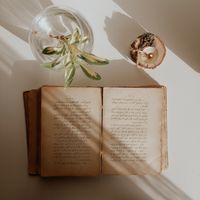 An open book — photo by Fatma Kazar on Pexels