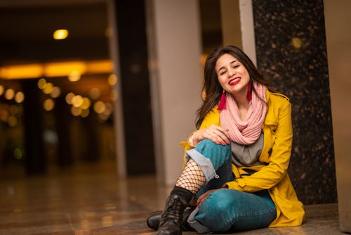 Photo of Woman Sitting On Floor