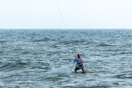 Kitesurfer Glide the Ocean