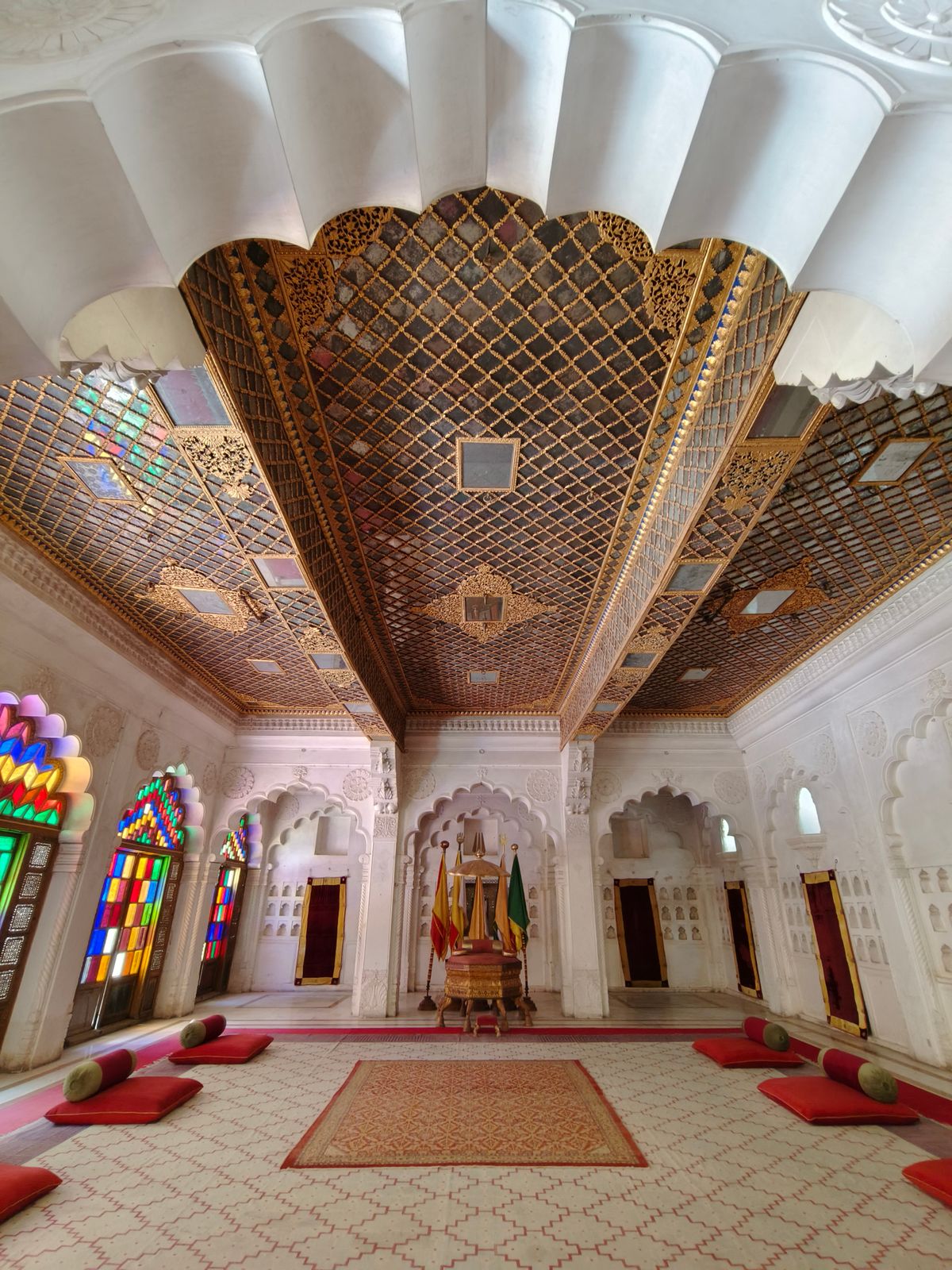 Elaborate Indian temple interior with traditional architectural details