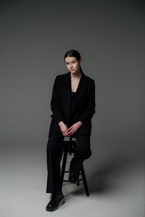 Woman Posing in Black Suit · Free Stock Photo