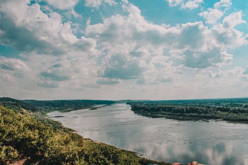 Free Aerial view showing the picturesque Belaya River and surrounding landscape in Bashkortostan, Russia. Stock Photo