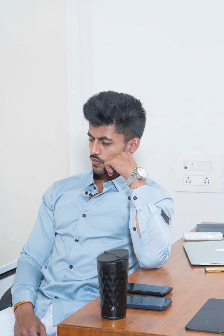 Man Thinking At Office