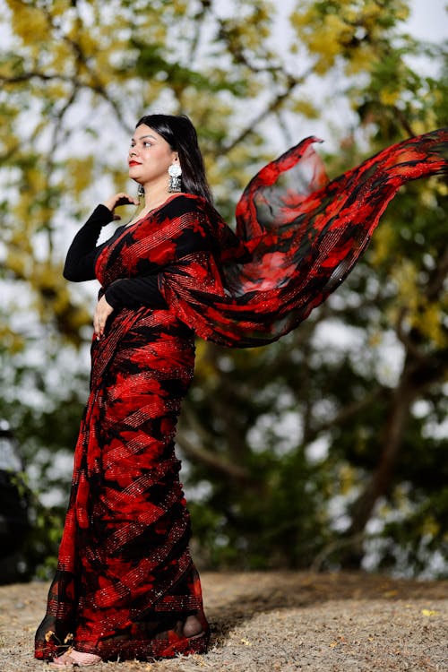 Woman Posing in Red Dress