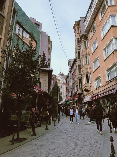 Free Explore a lively street in Istanbul, Türkiye with vibrant shops and classic architecture. Stock Photo