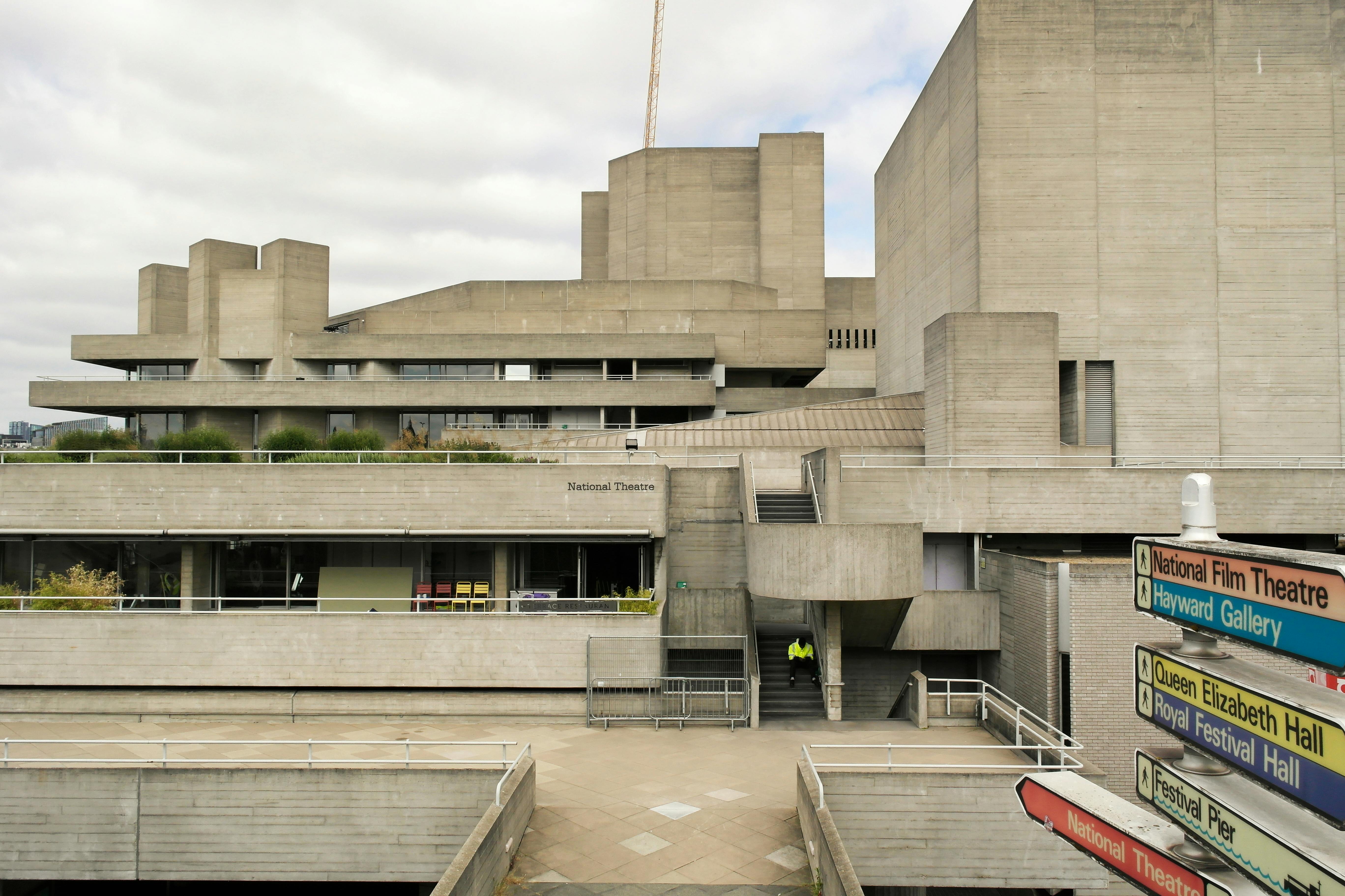 Free Exterior view of the iconic Brutalist National Theatre in London highlighting its unique modern architecture. Stock Photo