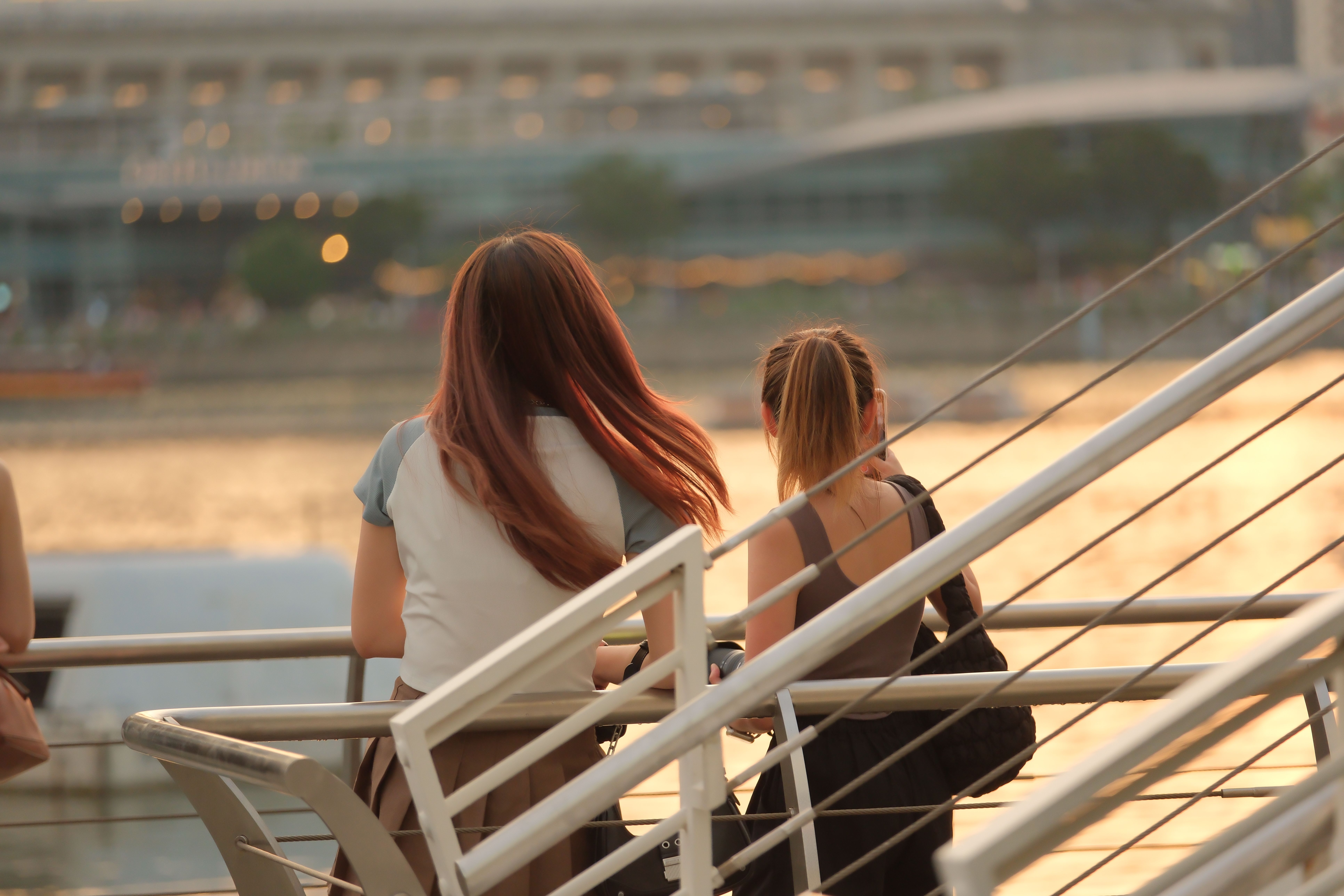 Young Women Standing on the Deck of a Cruise Ship and Looking at a View ...