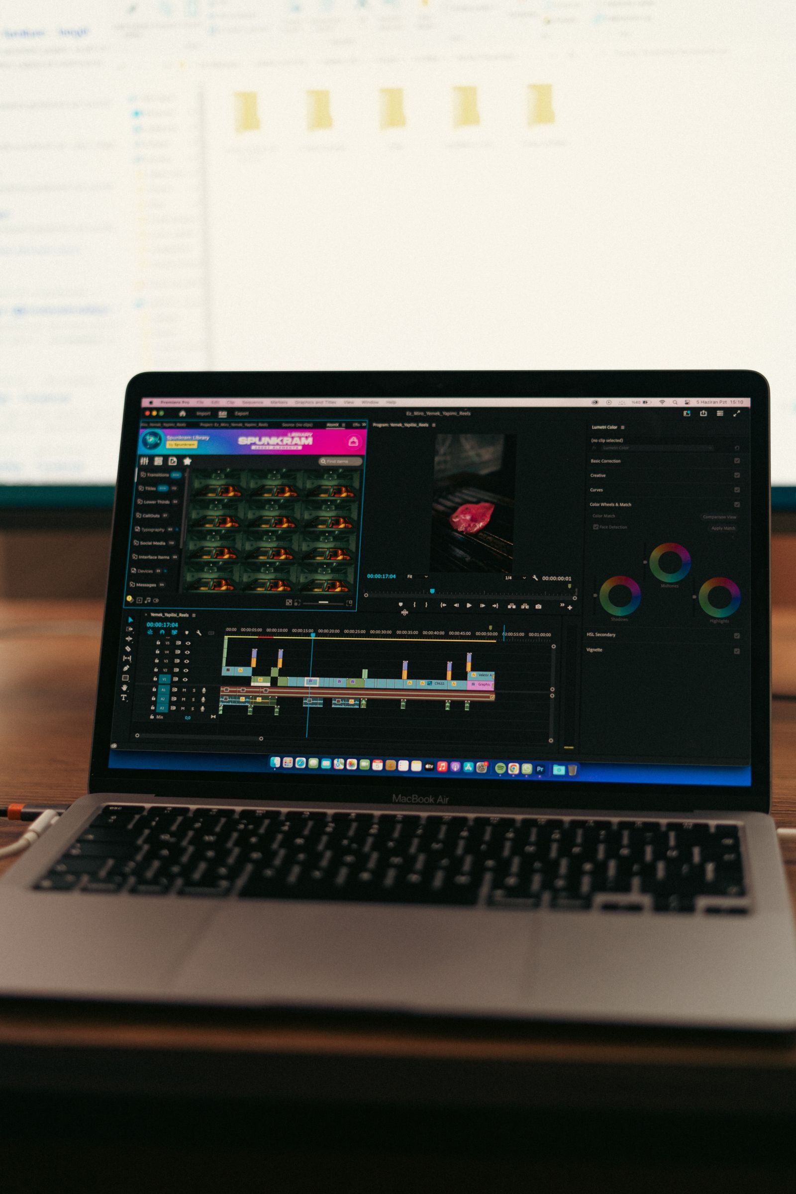 A laptop displaying video editing software, ideal for media professionals