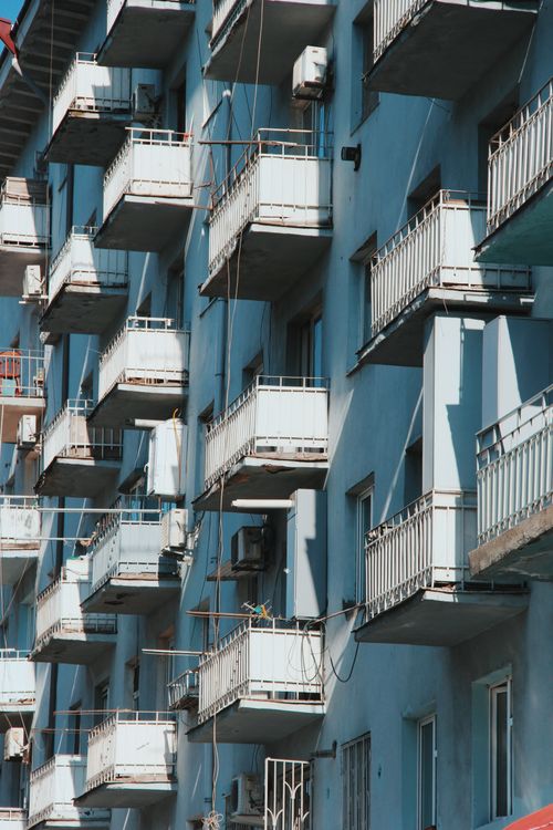Free High-rise residential building with multiple balconies in Tbilisi, Georgia, reflecting urban living. Stock Photo