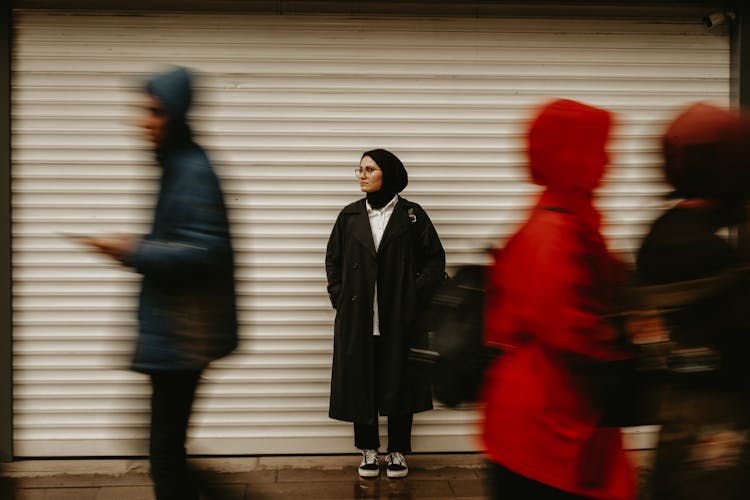 Woman In Hijab Amonng People Walking