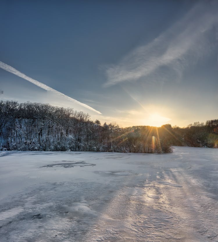 Frozen Lake At Sunset