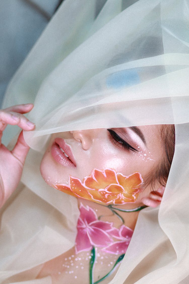 Woman Posing With Petals On Face