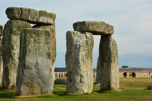 Free Explore the iconic Stonehenge monument set against a serene landscape, perfect for travel enthusiasts. Stock Photo