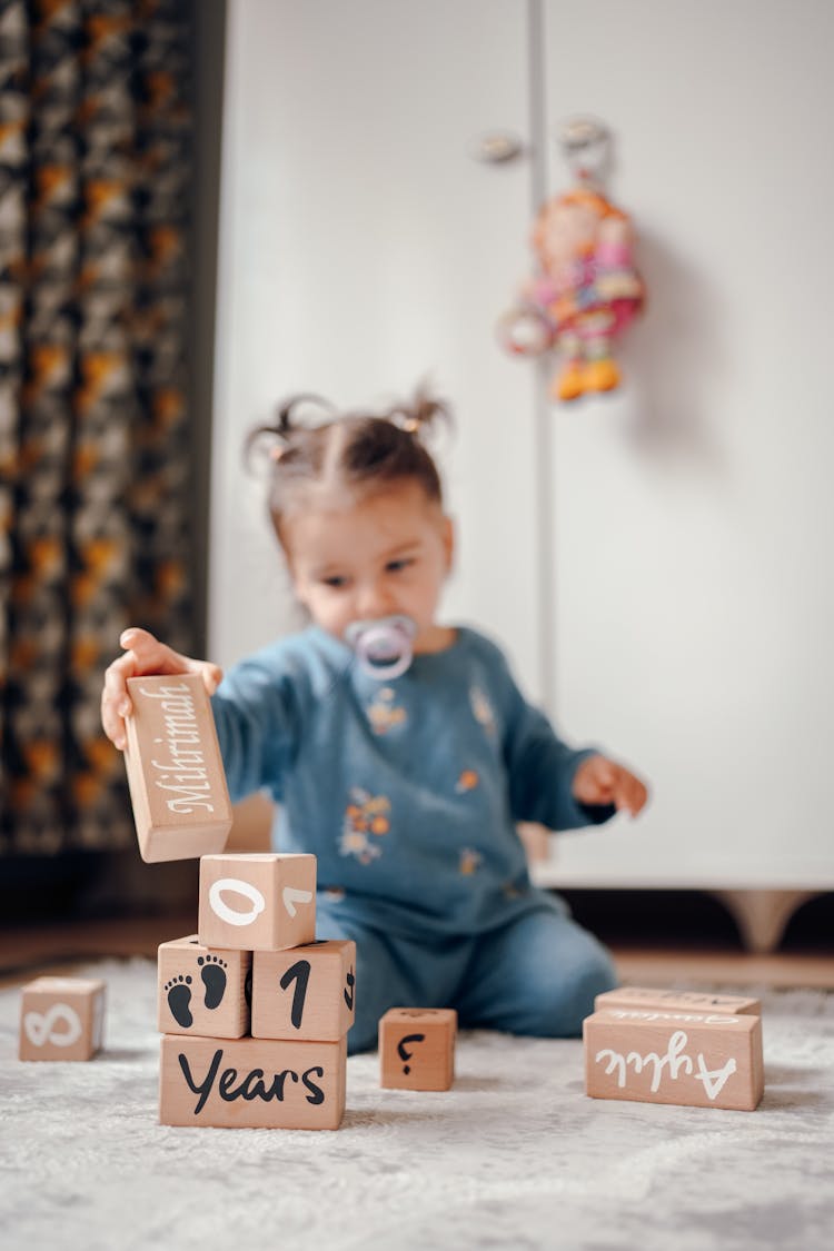 A Baby With Toys 