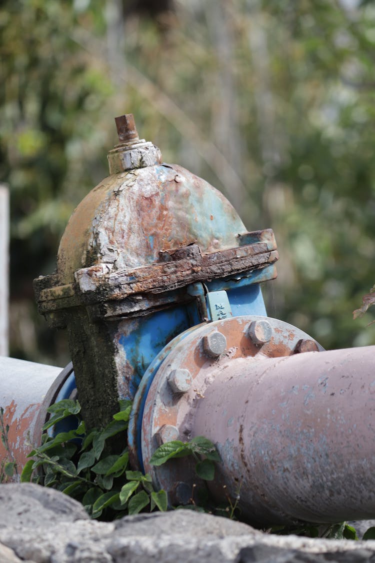 Old Rusty Valve On A Metal Water Pipe