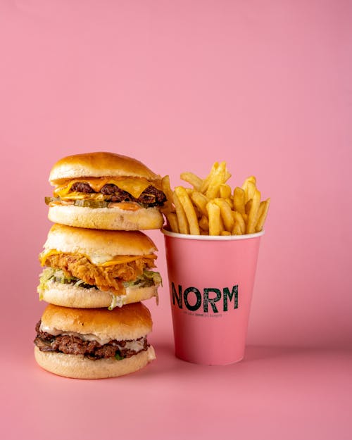 Studio Shoot of Fast Food against Pink Background