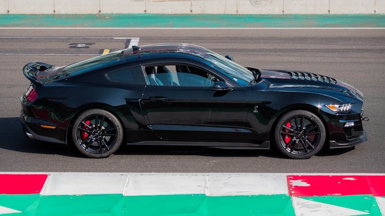 Black Sports Car On Racing Track