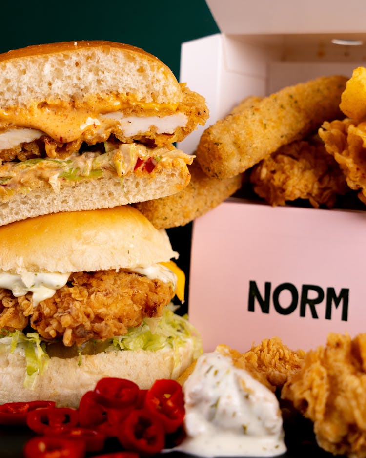 Close-Up Photo Of Burgers And Chicken Fingers