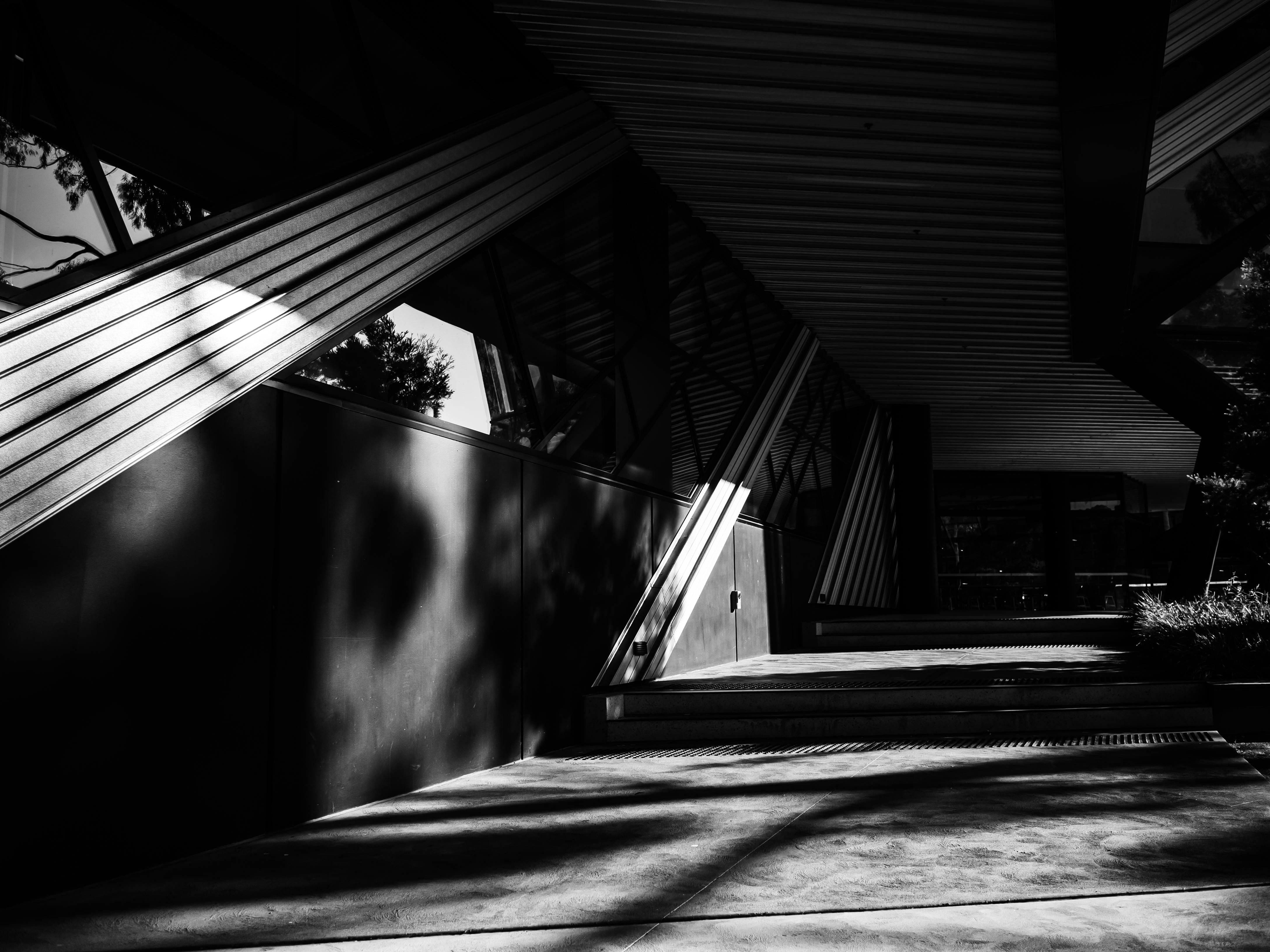 Balcony over Pavement between House Walls · Free Stock Photo