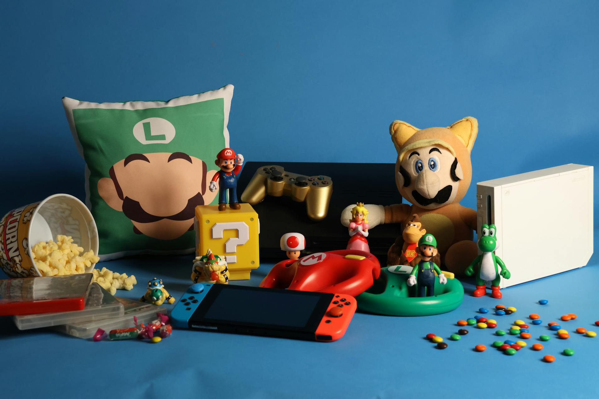 A Nintendo Switch and a Bunch of Super Mario Game Items