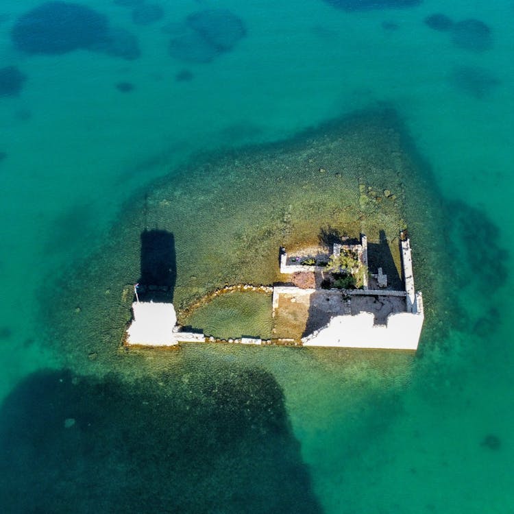 Ruins On Small Island On Sea Shore