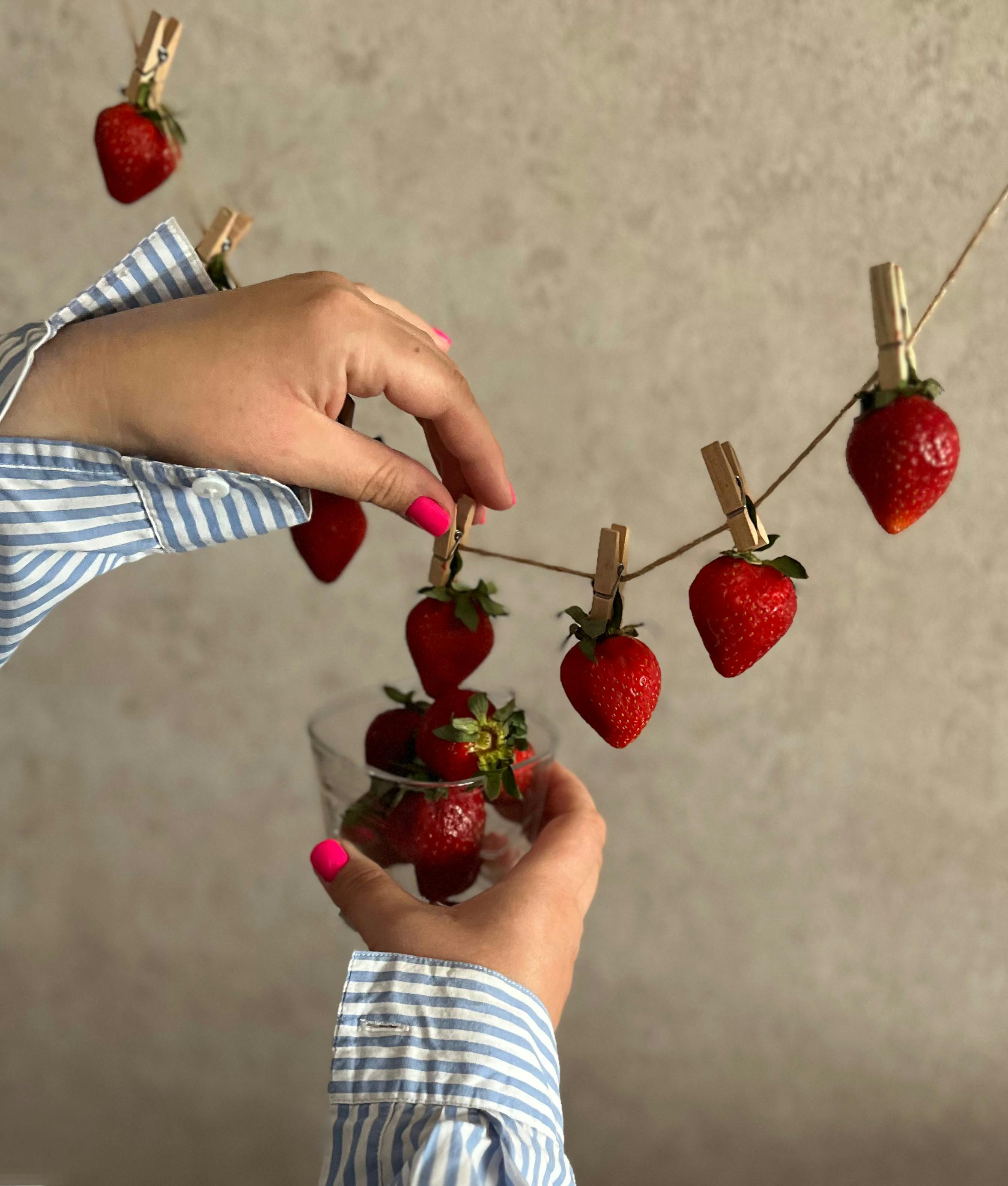 Red Strawberries Hanging on Strings · Free Stock Photo