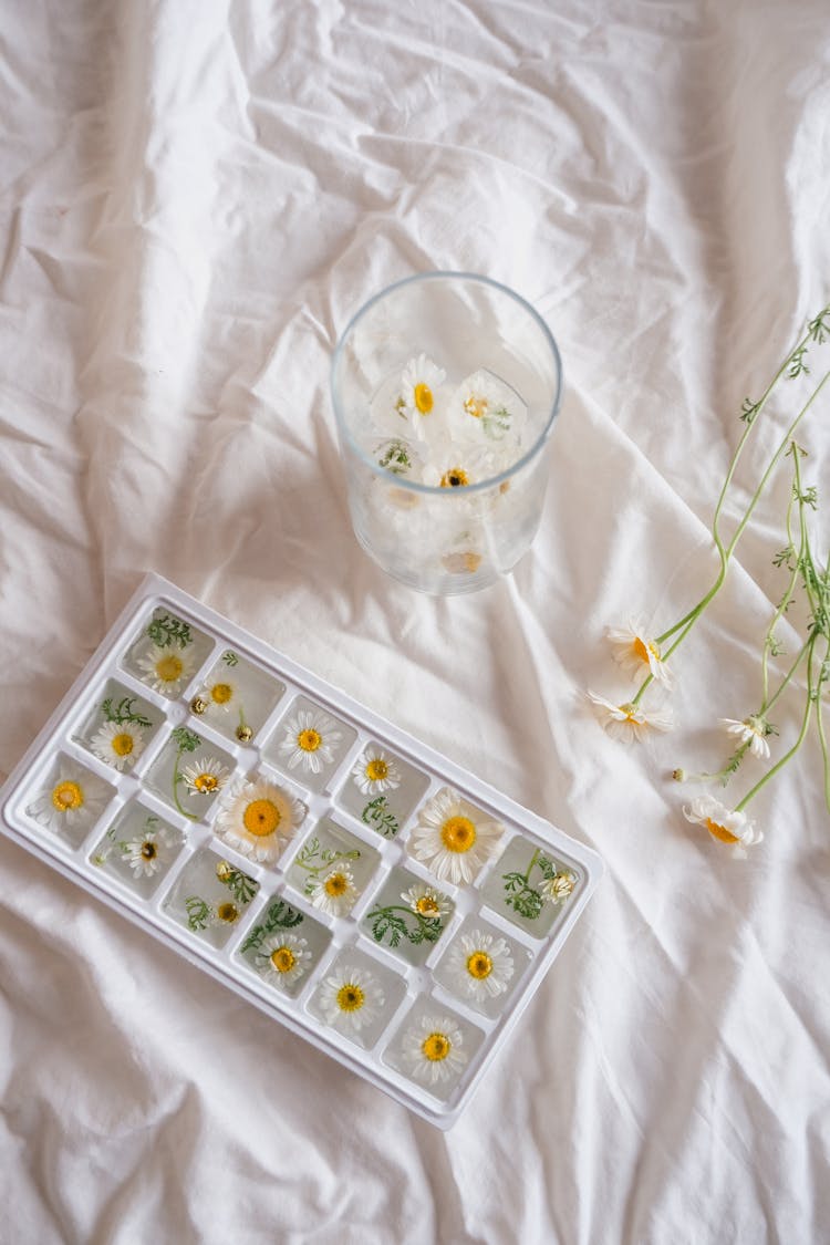 Box And Glass With Flowers