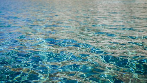 A close up of the water in a pool