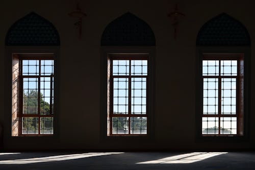 Silhouetted Interior with Sun Shining through the Large Windows 