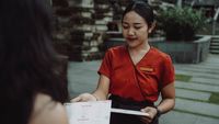 Waitress serving a guest