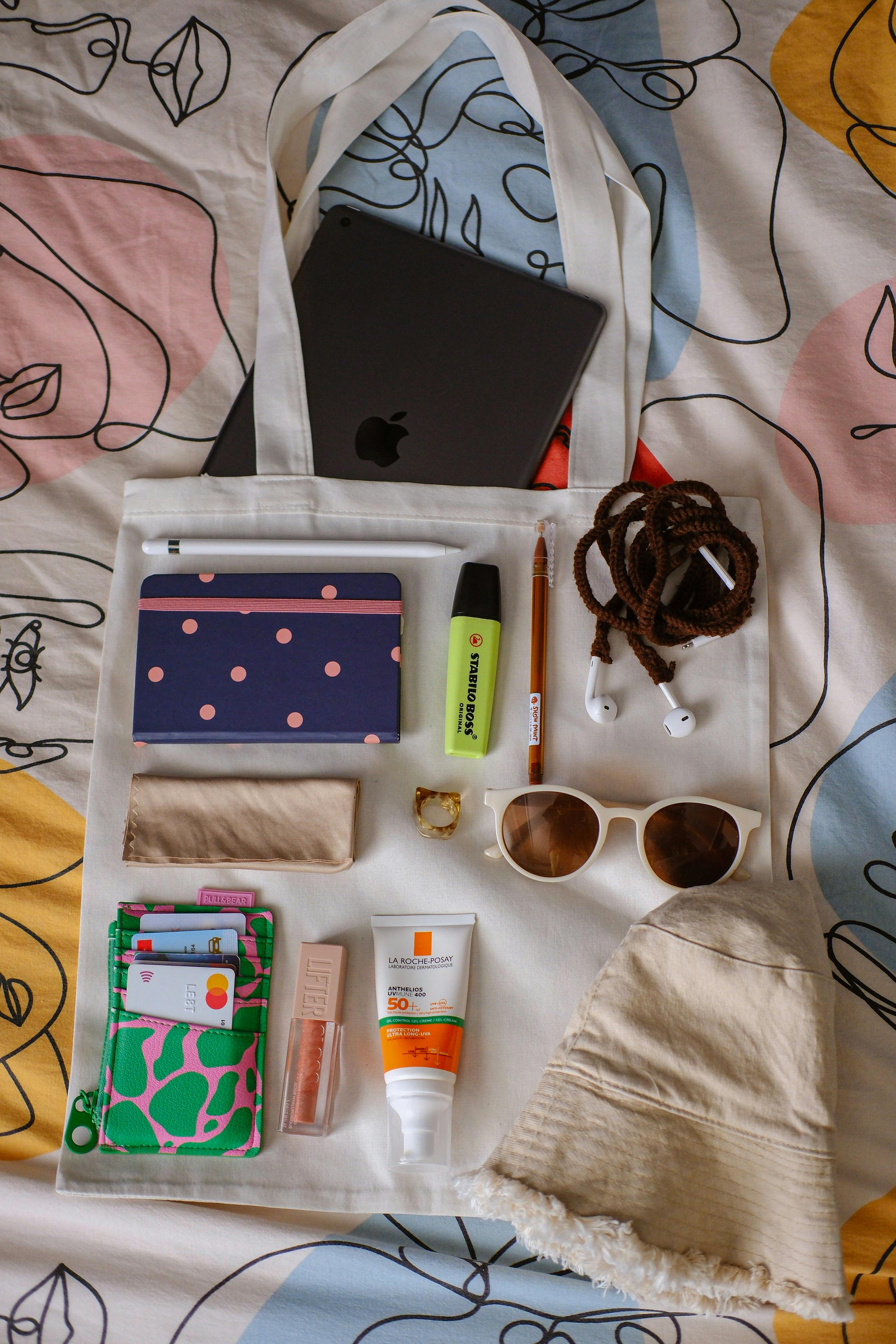 a tote bag with various items inside