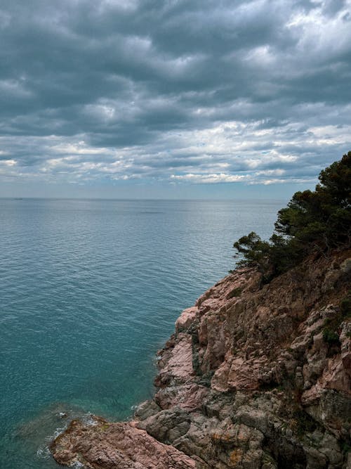 Overcast over Rocks on Sea Shore