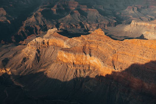 Beautiful aerial shot of Grand Canyon West's rugged landscape showcasing vibrant earth tones.