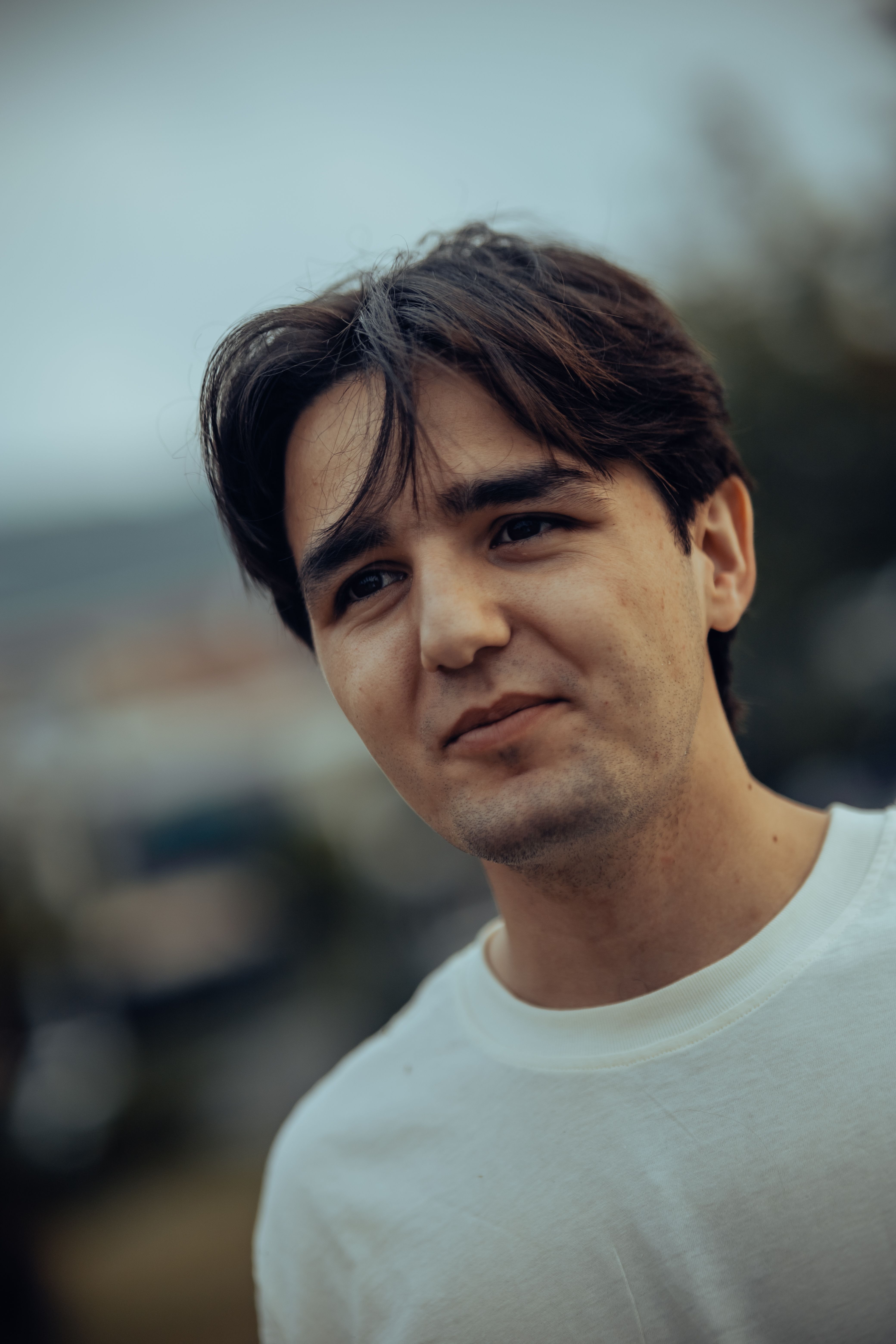 Portrait of a Young Man in a White T-shirt · Free Stock Photo