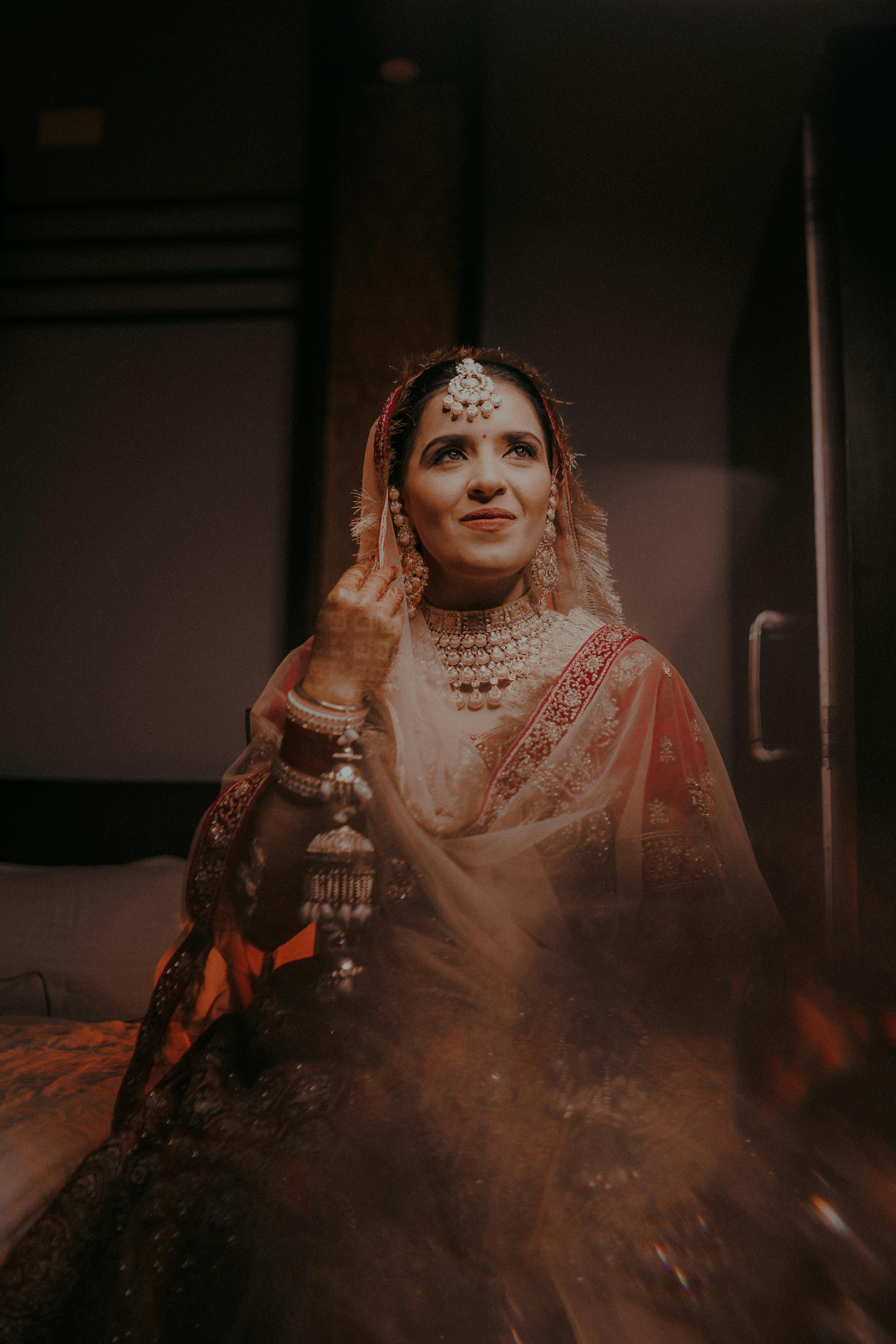 Beautiful Indian bride in exquisite traditional attire, showcasing cultural elegance.