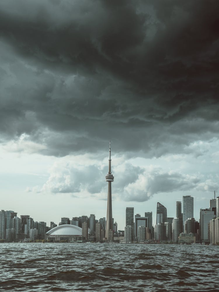 Skyline Of Toronto Under A Cloudy Sky Seen From The Lake 