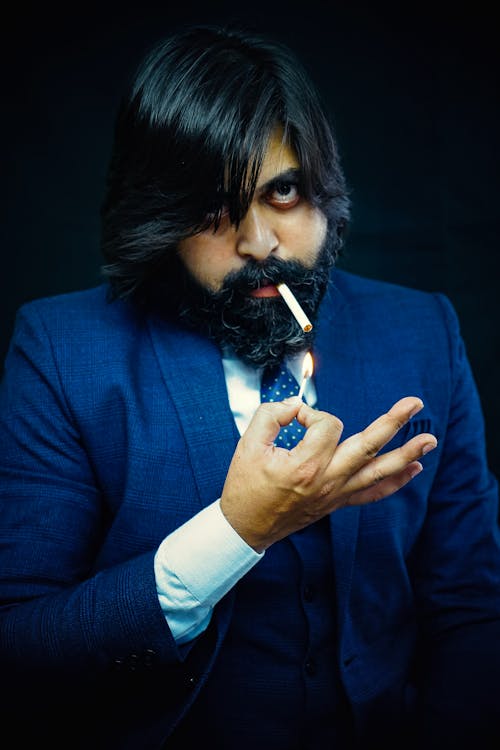 Indian handsome beard man smoking