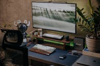 Desk with Keyboards and Screen