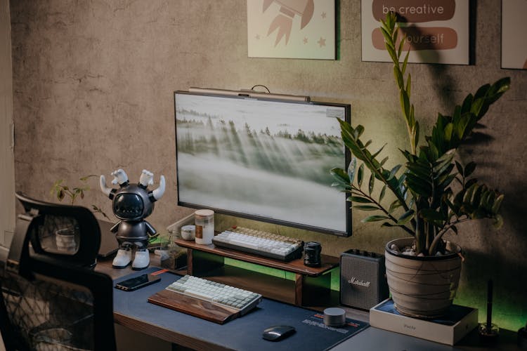 Computer On A Desk In A Bedroom