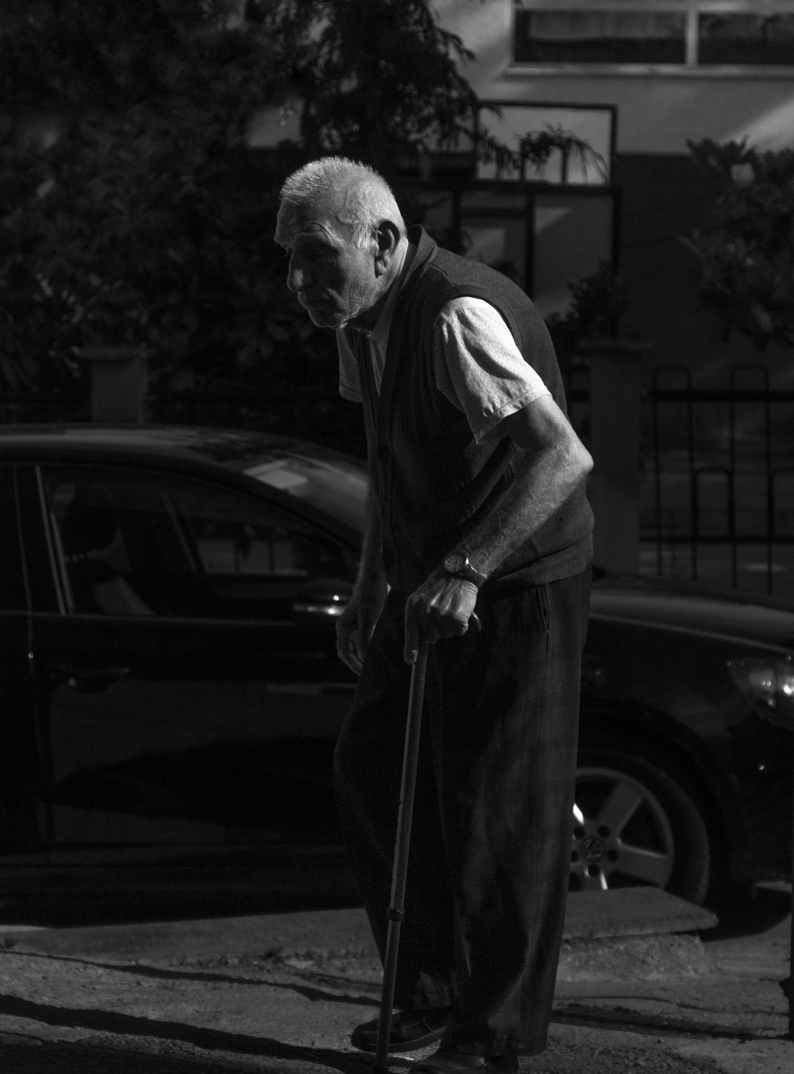 elderly man in black and white