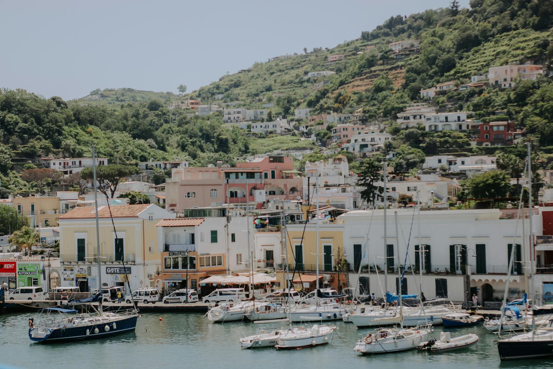Sailboats in the Marina in front of Traditional Houses