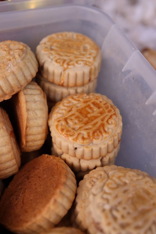 Food Container Mooncake A Bunch of Mooncakes in a Container · Free Stock Photo