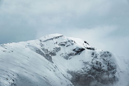Free Stunning view of a snow-covered mountain peak in Berchtesgaden, Germany. Stock Photo