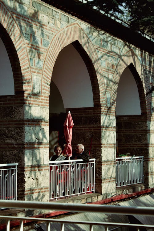 Men Sitting on Terrace