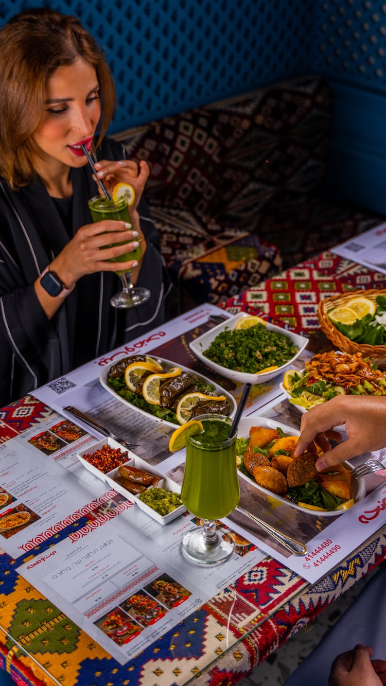 Man And Woman Eating Seafood