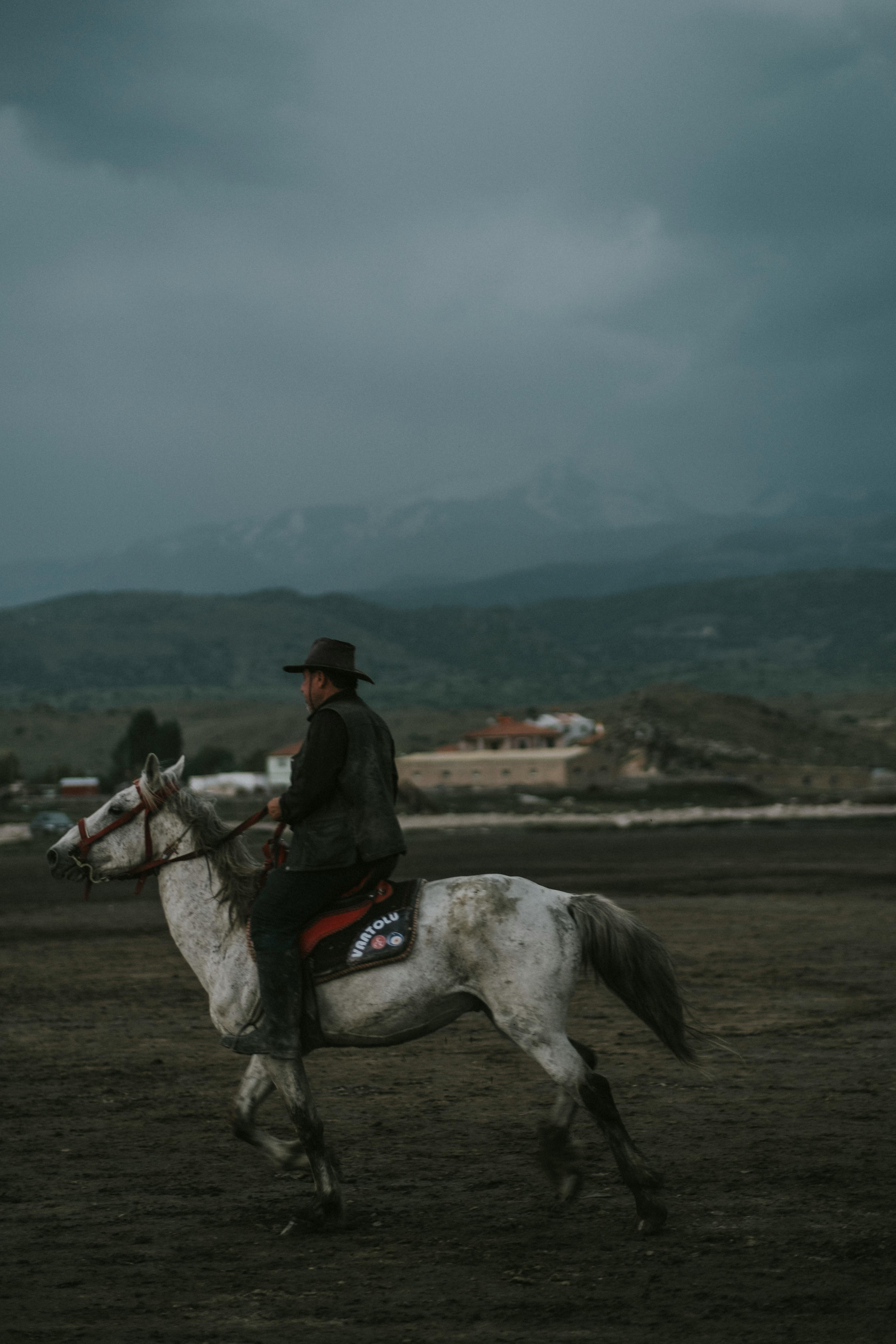 Man Riding Horse