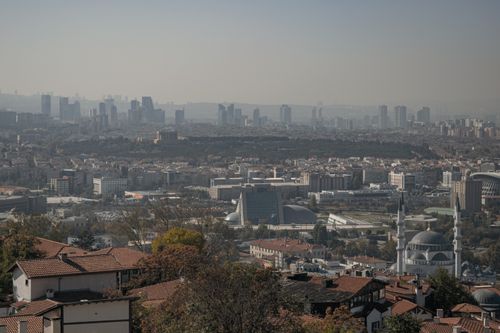 Free Aerial view of Ankara cityscape highlighting a prominent mosque amidst urban architecture. Stock Photo