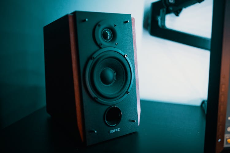 Modern Music Speaker On Table At Home